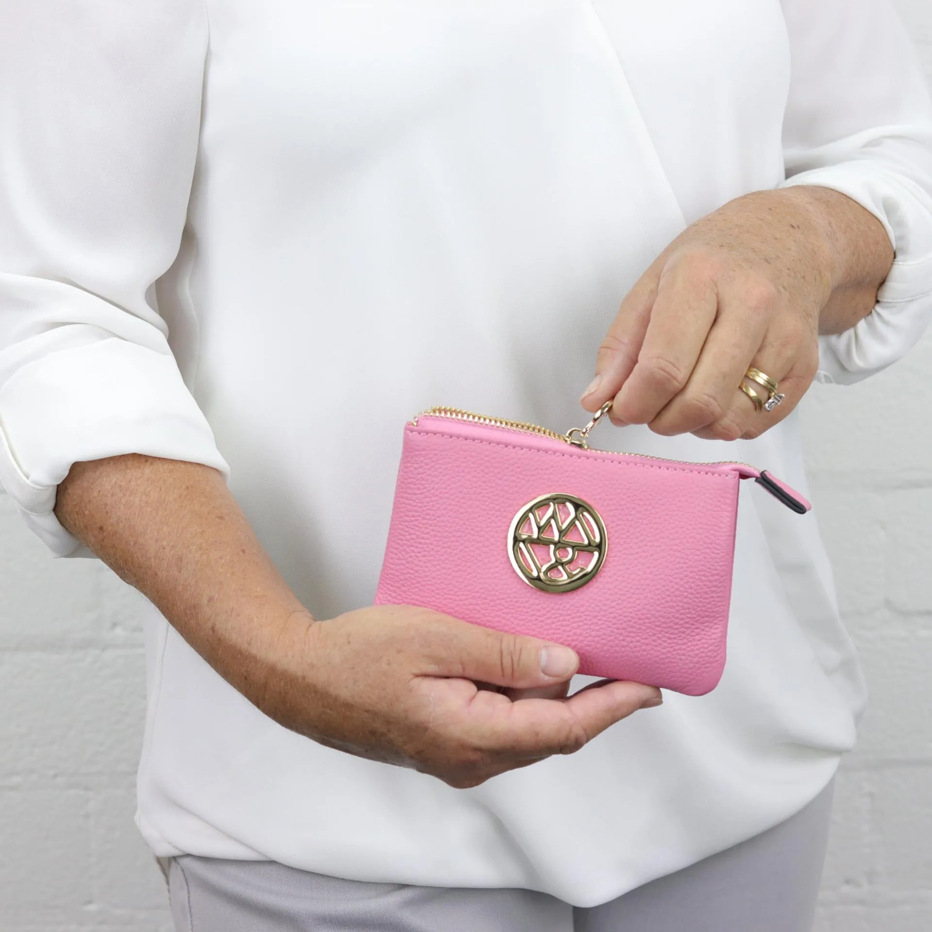 Harmony pebbled leather or printed suede pouch