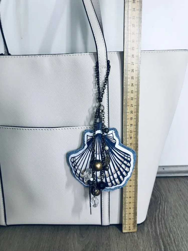 Ocean inspired upcycled denim and vintage necklace bag charm with scallop pendant